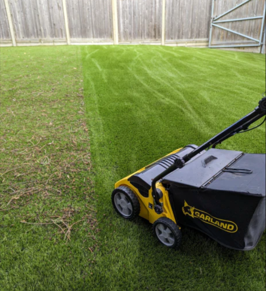 Garland 502E artificial turf sweeper adjustable height mechanism close-up
